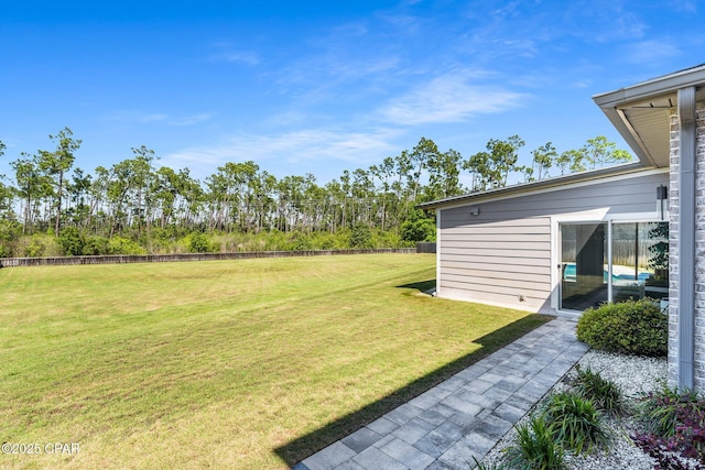 view of yard featuring fence