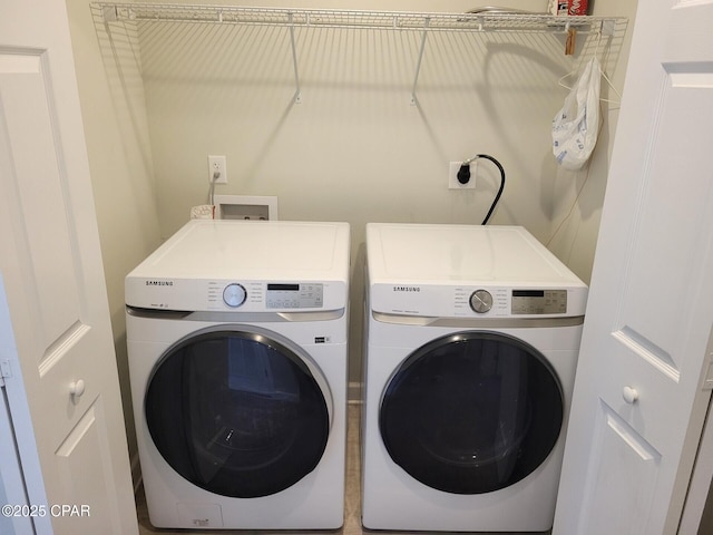 laundry area featuring laundry area and washer and dryer