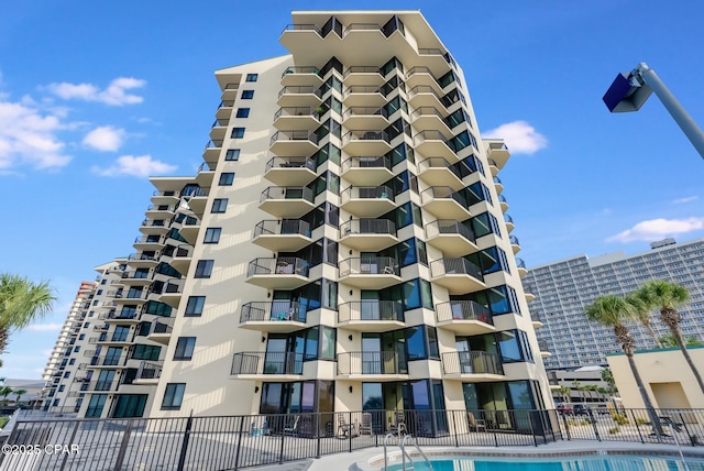 9850 S Thomas Dr Unit 810E, Panama City, FL 32408 - view of apartment building / complex featuring fence
