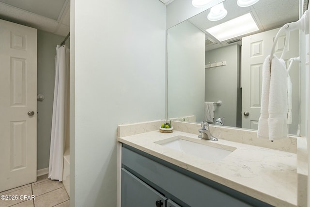 9850 S Thomas Dr Unit 810E, Panama City, FL 32408 - full bath featuring tile patterned floors, vanity, and shower / bathtub combination with curtain