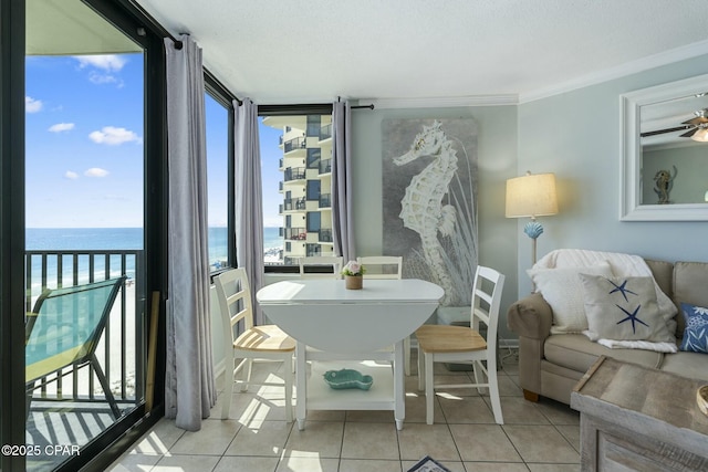 9850 S Thomas Dr Unit 810E, Panama City, FL 32408 - sunroom with a water view and plenty of natural light