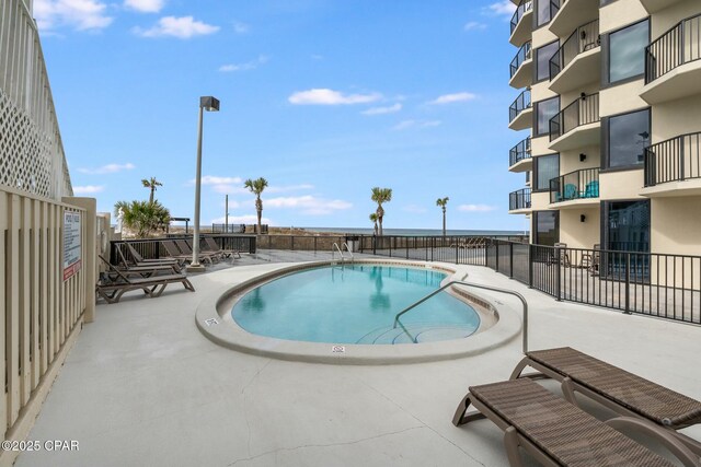 9850 S Thomas Dr Unit 810E, Panama City, FL 32408 - community pool with a patio