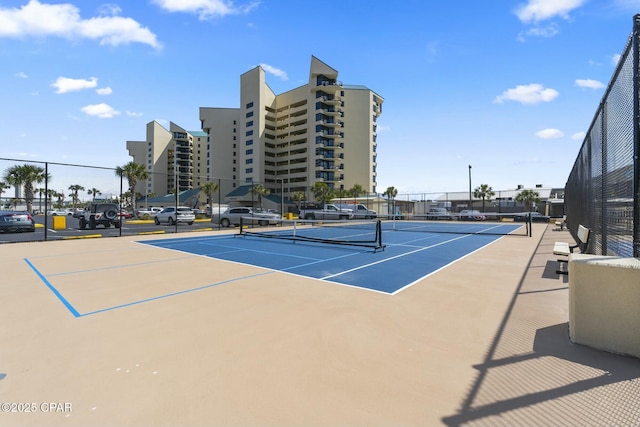 9850 S Thomas Dr Unit 810E, Panama City, FL 32408 - view of tennis court featuring fence