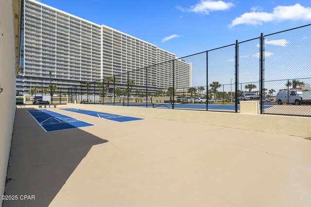 9850 S Thomas Dr Unit 810E, Panama City, FL 32408 - view of community with a tennis court