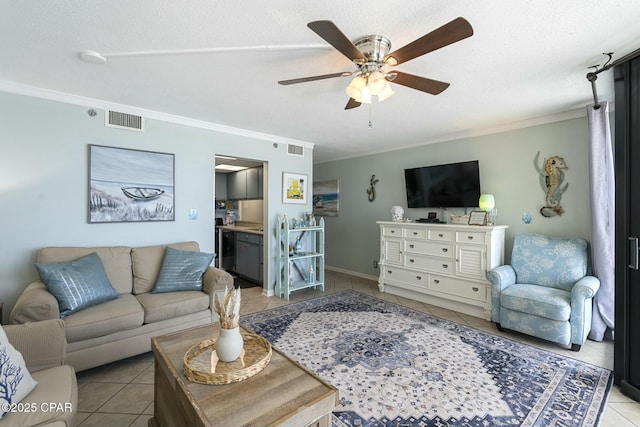 9850 S Thomas Dr Unit 810E, Panama City, FL 32408 - tiled living area featuring crown molding, a ceiling fan, and a textured ceiling