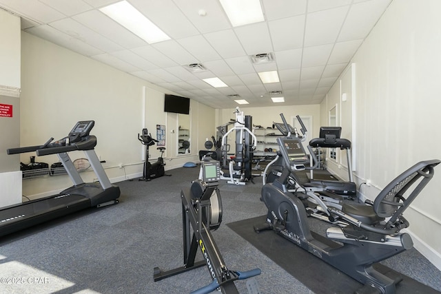 9850 S Thomas Dr Unit 810E, Panama City, FL 32408 - gym featuring a paneled ceiling and baseboards