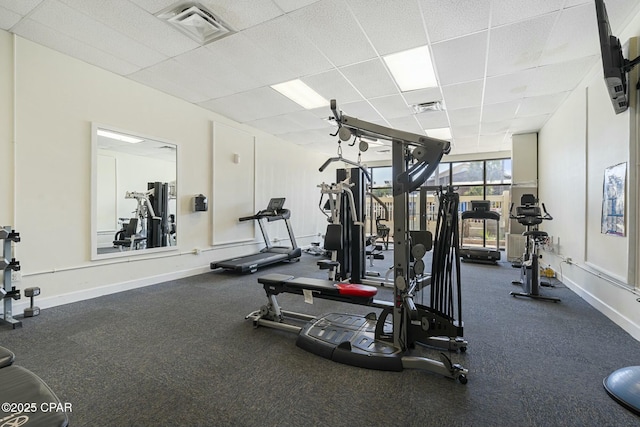 9850 S Thomas Dr Unit 810E, Panama City, FL 32408 - workout area with a drop ceiling and baseboards
