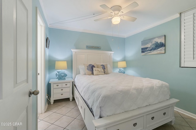 9850 S Thomas Dr Unit 810E, Panama City, FL 32408 - bedroom with light tile patterned flooring, crown molding, baseboards, and a ceiling fan