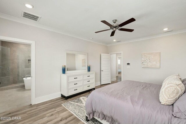 19 Mckenna Way, Santa Rosa Beach, FL 32459 - bedroom featuring baseboards, visible vents, ensuite bathroom, and crown molding