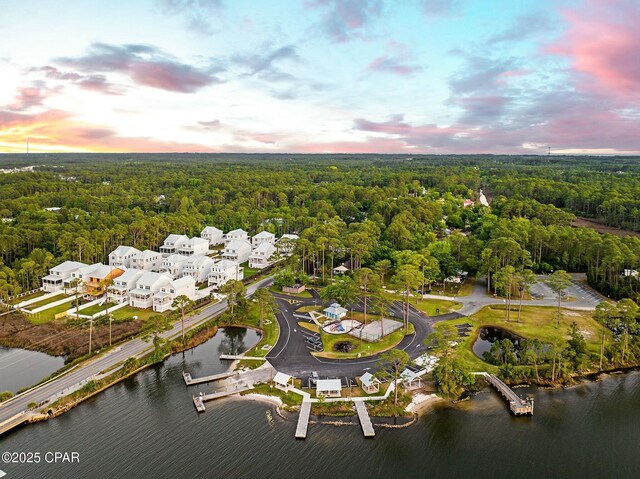 19 Mckenna Way, Santa Rosa Beach, FL 32459 - aerial view at dusk with a water view and a wooded view