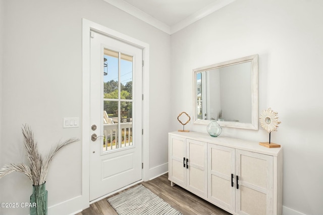 19 Mckenna Way, Santa Rosa Beach, FL 32459 - entryway featuring wood finished floors, crown molding, and baseboards