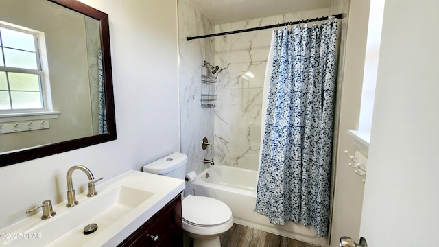 full bath featuring shower / bath combo with shower curtain, toilet, wood finished floors, and vanity