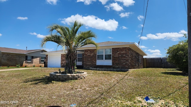 ranch-style house with a garage, brick siding, fence, and a front lawn