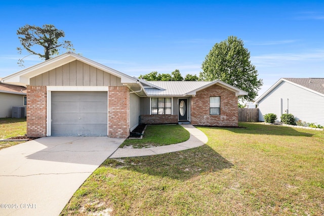 ranch-style home with an attached garage, concrete driveway, a front lawn, and brick siding
