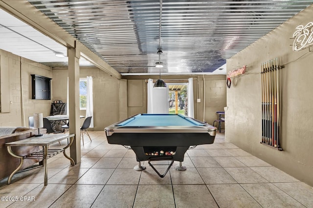 playroom with tile patterned floors, a healthy amount of sunlight, and pool table