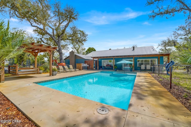 view of swimming pool featuring fence, a patio area, a pergola, and a fenced in pool