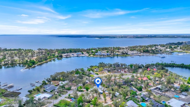 aerial view with a residential view and a water view