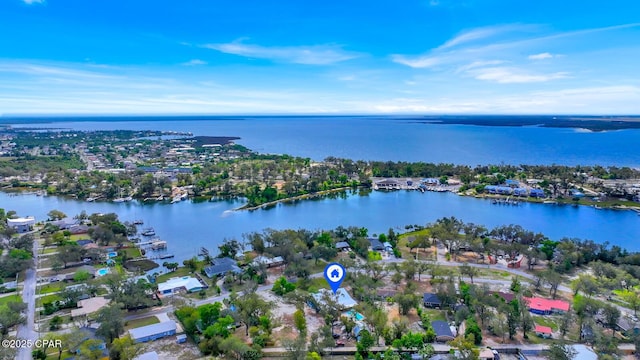 birds eye view of property with a residential view and a water view