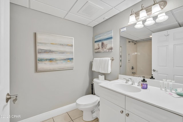 14701 Front Beach Rd Unit 834, Panama City Beach, FL 32413 - bathroom with a paneled ceiling, tile patterned flooring, toilet, vanity, and baseboards