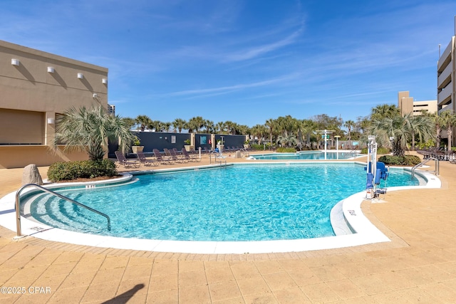 14701 Front Beach Rd Unit 834, Panama City Beach, FL 32413 - community pool featuring a patio area