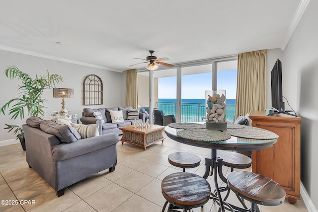 14701 Front Beach Rd Unit 834, Panama City Beach, FL 32413 - living area featuring a ceiling fan, ornamental molding, light tile patterned flooring, and baseboards