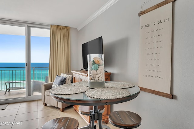 14701 Front Beach Rd Unit 834, Panama City Beach, FL 32413 - dining space with plenty of natural light, ornamental molding, light tile patterned flooring, and expansive windows