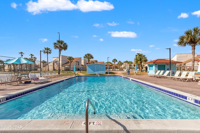 17462 Front Beach Rd Unit 24C, Panama City Beach, FL 32413 - community pool featuring a residential view and a patio