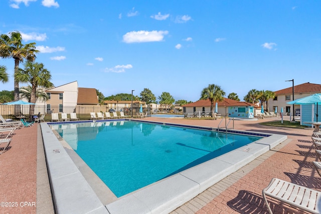 17462 Front Beach Rd Unit 24C, Panama City Beach, FL 32413 - community pool with a residential view and a patio