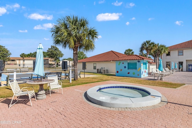 17462 Front Beach Rd Unit 24C, Panama City Beach, FL 32413 - view of pool featuring a patio, a hot tub, and central AC unit