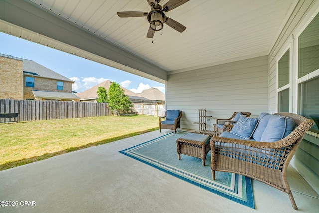 view of patio with a ceiling fan and a fenced backyard