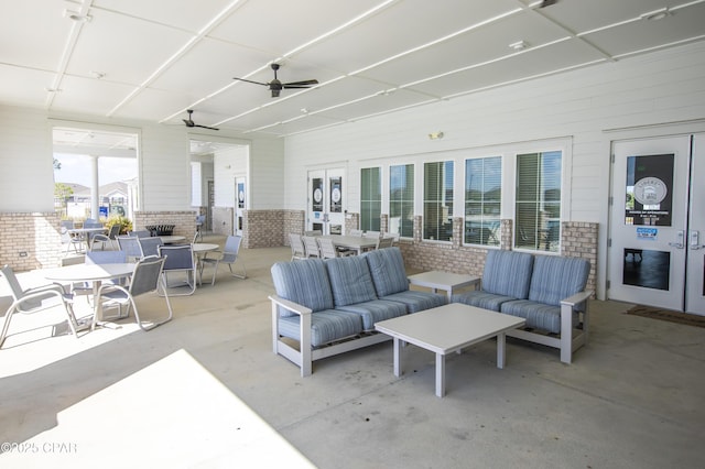 view of patio / terrace featuring ceiling fan, an outdoor hangout area, and outdoor dining space