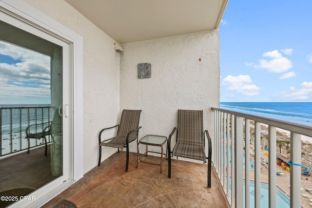8743 Thomas Dr Unit 809, Panama City Beach, FL 32408 - balcony featuring view of water and beach