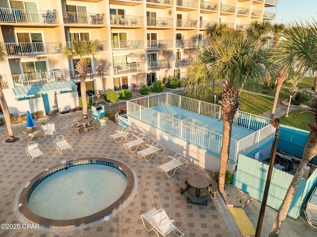 8743 Thomas Dr Unit 809, Panama City Beach, FL 32408 - community pool with fence and a patio