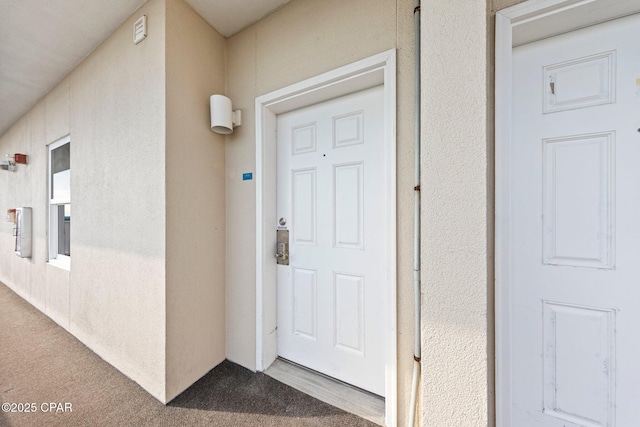 9860 S Thomas Dr Unit 1018, Panama City Beach, FL 32408 - property entrance featuring stucco siding