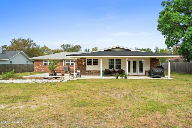 629 Old Forest Way, Panama City, FL 32404 - rear view of property with french doors, brick siding, and a patio area