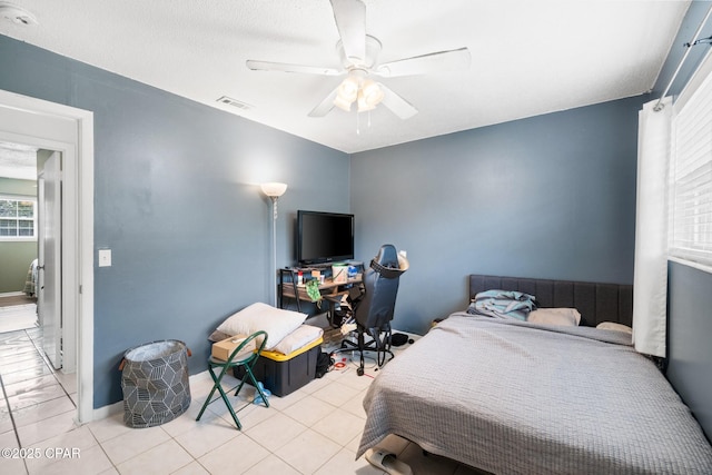 629 Old Forest Way, Panama City, FL 32404 - bedroom with tile patterned floors and a ceiling fan