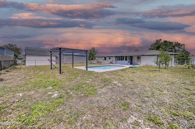 4102 Leslie Ln, Panama City, FL 32404 - back of house with a fenced in pool, a fenced backyard, a lawn, and a pergola