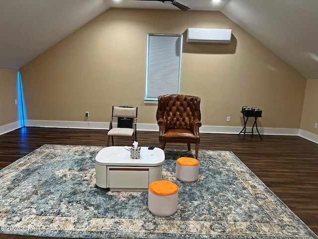 3639 Preserve Blvd, Panama City Beach, FL 32408 - sitting room featuring wood finished floors, baseboards, a wall mounted AC, and vaulted ceiling