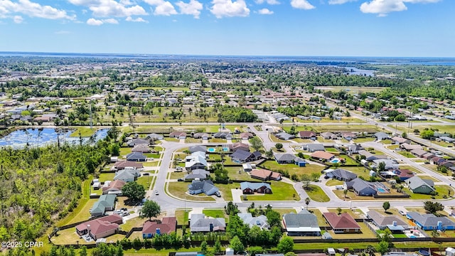 aerial view featuring a water view and a residential view