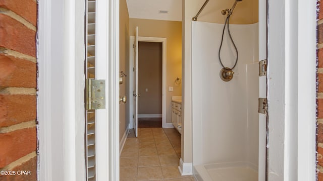 1222 Huntington Ridge Rd, Lynn Haven, FL 32444 - hall featuring light tile patterned floors, baseboards, and visible vents