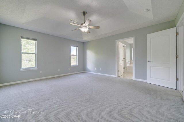 4704 Shannon Ln, Panama City, FL 32404 - unfurnished bedroom with a ceiling fan, light colored carpet, visible vents, baseboards, and connected bathroom