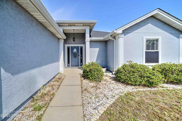 4704 Shannon Ln, Panama City, FL 32404 - doorway to property featuring stucco siding