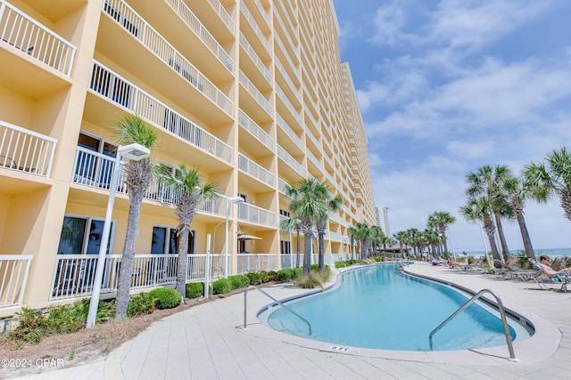 pool featuring a patio area