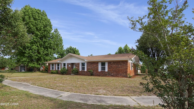 325 Bell Cir, Lynn Haven, FL 32444 - single story home featuring a front lawn and brick siding