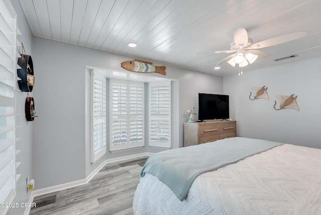 135 Bid A Wee Ln, Panama City Beach, FL 32413 - bedroom featuring wood finished floors, recessed lighting, baseboards, and ceiling fan
