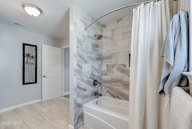 135 Bid A Wee Ln, Panama City Beach, FL 32413 - full bathroom with baseboards and shower / bathtub combination with curtain