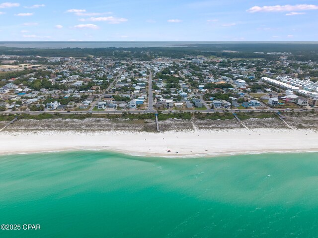 135 Bid A Wee Ln, Panama City Beach, FL 32413 - aerial overview of property's location with unending shoreline and nearby suburban area