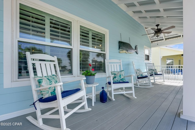 135 Bid A Wee Ln, Panama City Beach, FL 32413 - deck with a ceiling fan and a porch