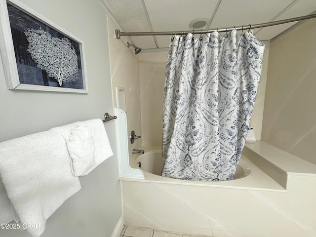 full bath with tile patterned flooring and shower / tub combo