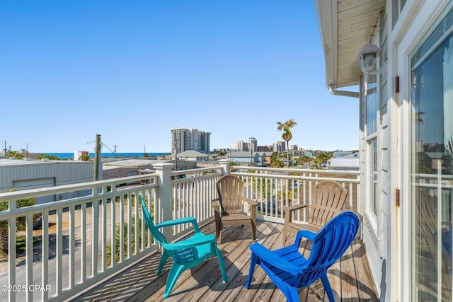 balcony featuring a water view